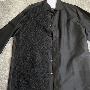 100% silk designer shirt. Sure to turn heads when you go out. French cuffs.